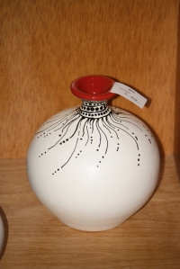 Red mouthed vase